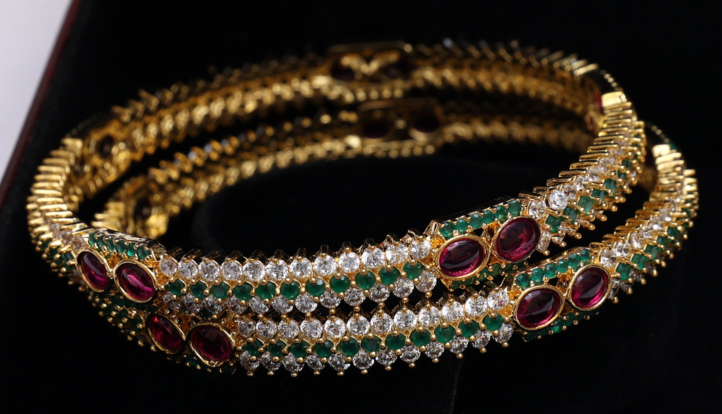 Green Stone and Pink Stone Studded Infinity Gold Bangles Set