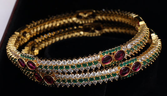 Green Stone and Pink Stone Studded Infinity Gold Bangles Set