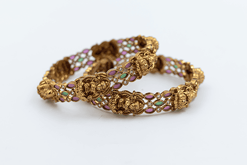 Regal Deity-Adorned Gold-Toned Bangles