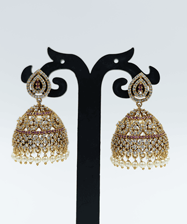 Gold Toned Jhumka Earrings with Purple Accents