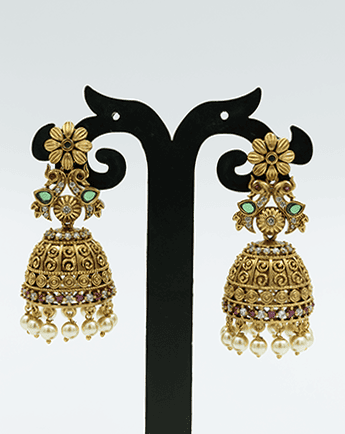 Charming Antique Gold Toned Jhumka Earrings with Floral Accents