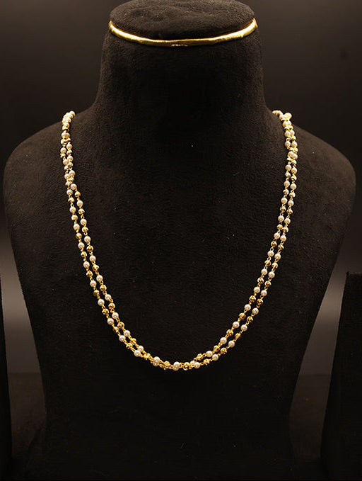 Gold necklace with golden and white pearls 